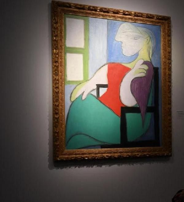 Picasso’nun 'Pencerenin yanında oturan kadın' tablosu 103 milyon dolara satıldı - Resim : 1